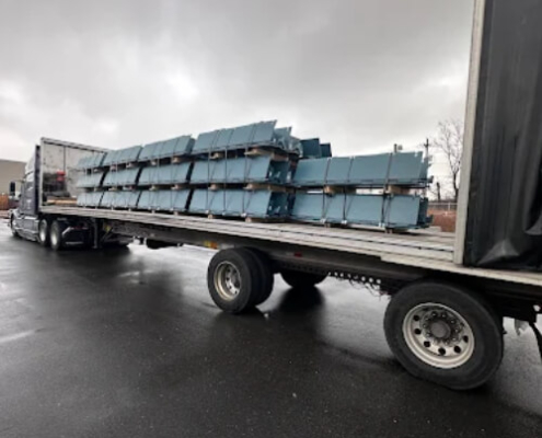 Transporting materials for custom garage doors in New York. Garage door design company, Garage Door Customs.
