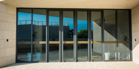 Full-view glass panel garage doors in Westchester County, NY are perfect for auto dealerships and fire stations/fire houses.